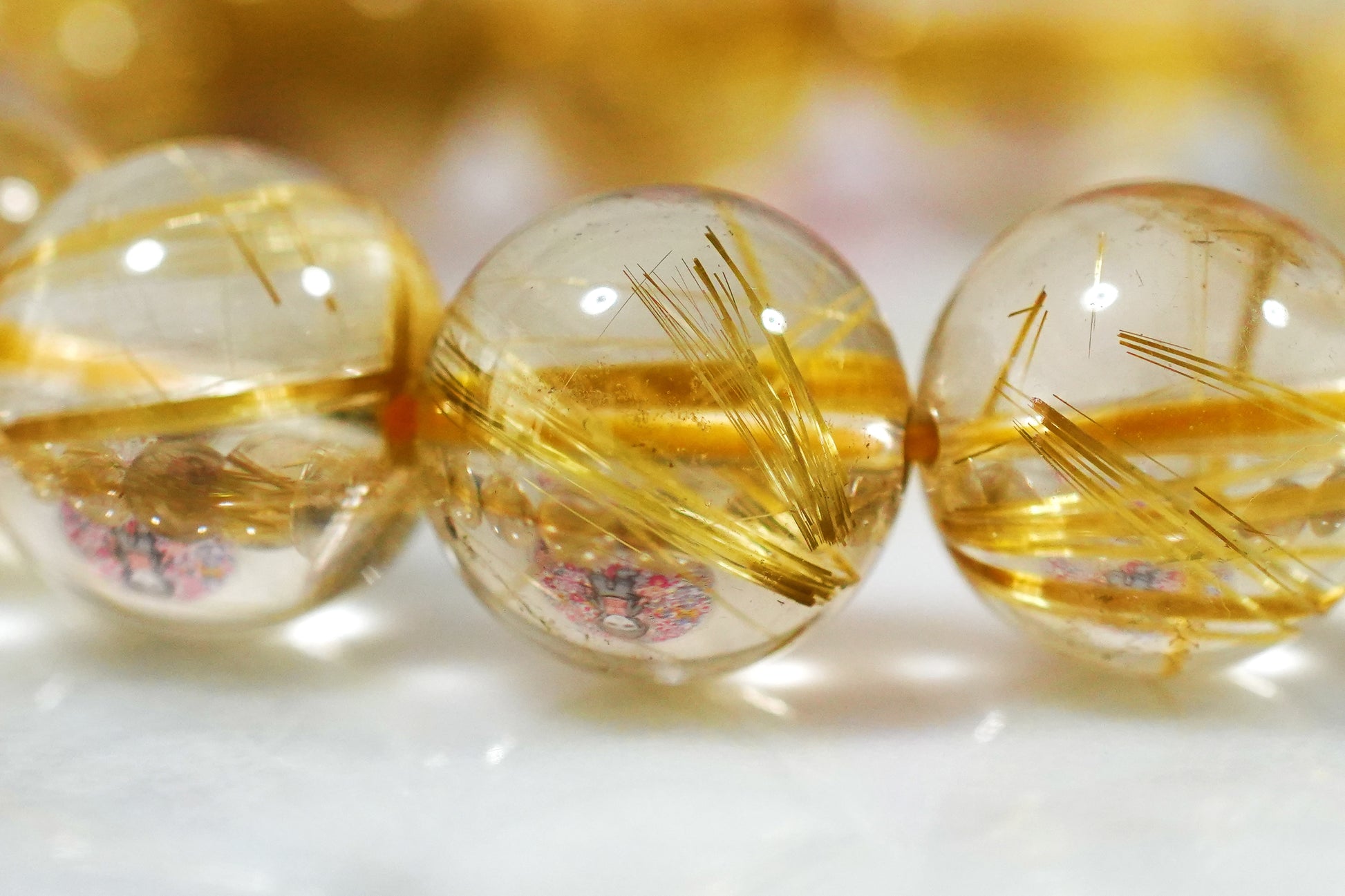 H 　　　　　　【透明度高】ルチルクォーツ 透明感あふれる輝きが魅力】ルチルクォーツ 12.75ct | まるむ商会